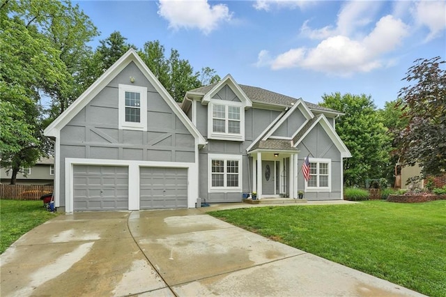 3945 SW Batten Dr, Lees Summit, MO 64082 - view of front facade featuring stucco siding, a garage, and driveway