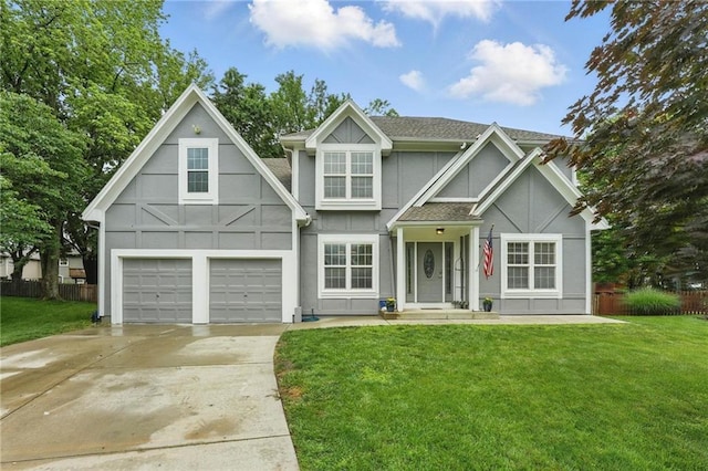 3945 SW Batten Dr, Lees Summit, MO 64082 - view of front of house with concrete driveway, stucco siding, a garage, and a shingled roof