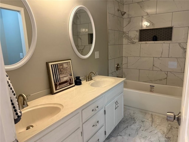 3945 SW Batten Dr, Lees Summit, MO 64082 - bathroom with marble look tile flooring, double vanity, and  shower combination