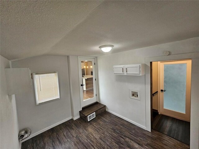 11115 E 35th Ter S, Independence, MO 64052 - bonus room with dark wood finished floors, a textured ceiling, baseboards, and lofted ceiling