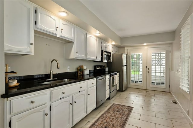 2616 W 47th Ter, Westwood, KS 66205 - kitchen featuring stainless steel appliances, white cabinets, and french doors