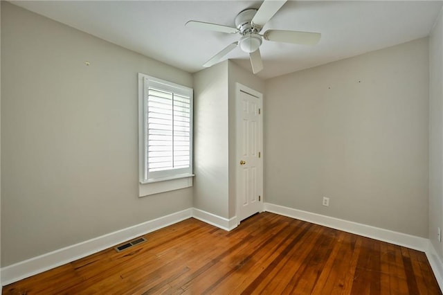 2616 W 47th Ter, Westwood, KS 66205 - empty room with hardwood / wood-style flooring and ceiling fan