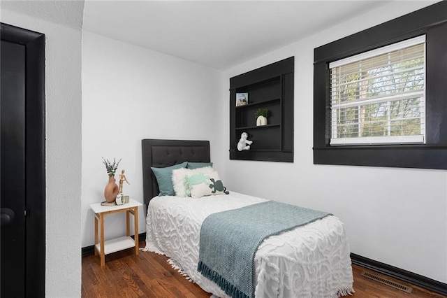 206 SW 22nd St, Blue Springs, MO 64015 - bedroom with wood finished floors and visible vents