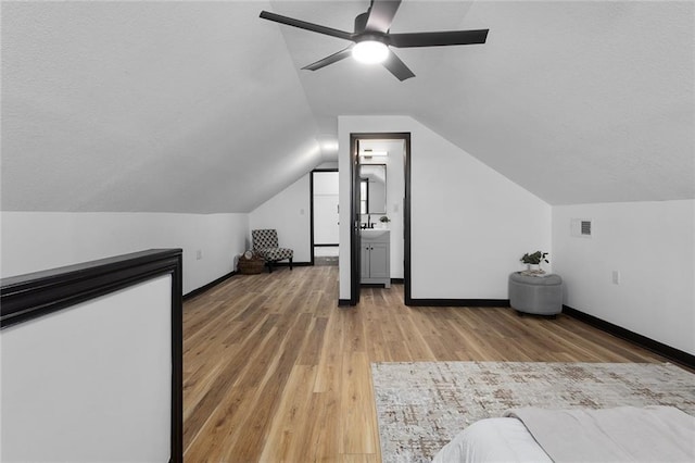 206 SW 22nd St, Blue Springs, MO 64015 - bonus room with vaulted ceiling, baseboards, light wood-style floors, and visible vents