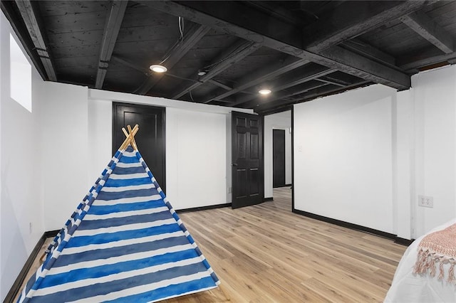 206 SW 22nd St, Blue Springs, MO 64015 - finished below grade area with wood finished floors and baseboards