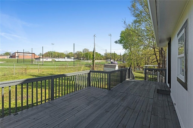 206 SW 22nd St, Blue Springs, MO 64015 - wooden deck featuring a yard