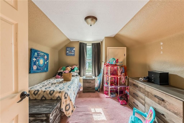 bedroom featuring carpet, a textured ceiling, and vaulted ceiling