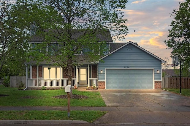 view of front of property featuring brick siding, an attached garage, fence, and concrete driveway
