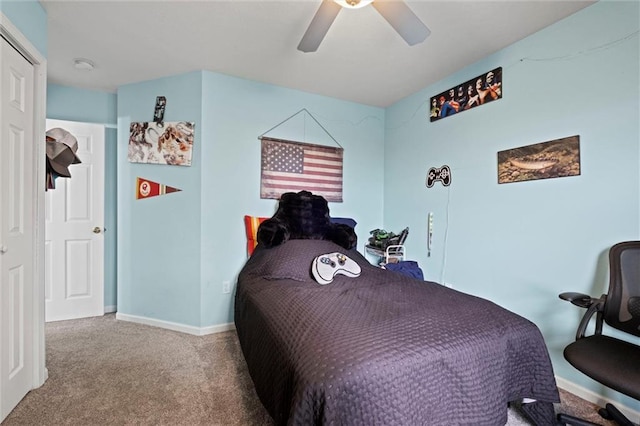 carpeted bedroom with a ceiling fan
