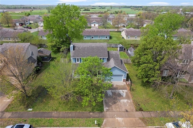 drone / aerial view with a residential view