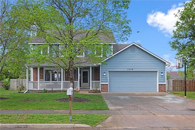 view of front facade with brick siding, an attached garage, and fence