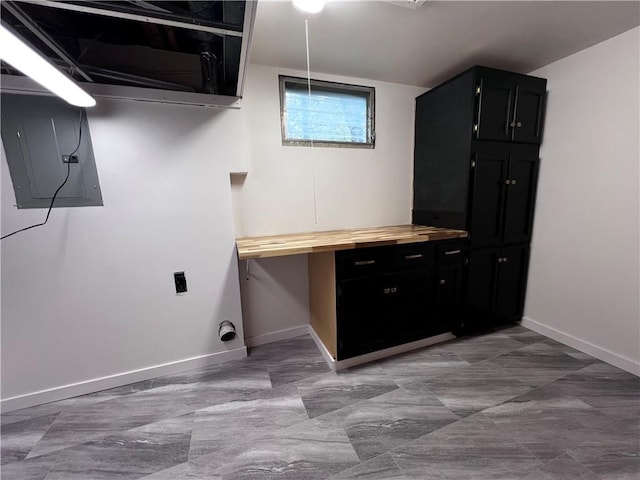 1803 Bird Ter, Harrisonville, MO 64701 - clothes washing area with baseboards