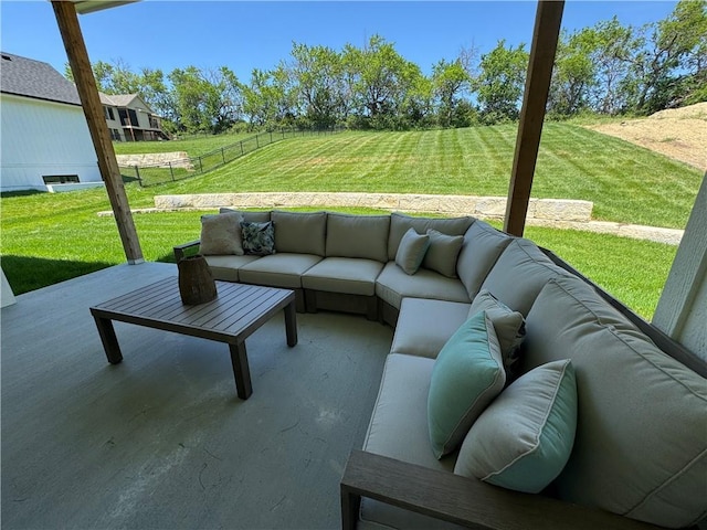 view of patio featuring outdoor lounge area and fence