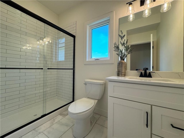 full bathroom with a stall shower, toilet, vanity, and marble finish floor