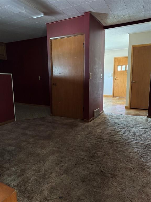 915 W 4th St, Chanute, KS 66720 - view of carpeted empty room