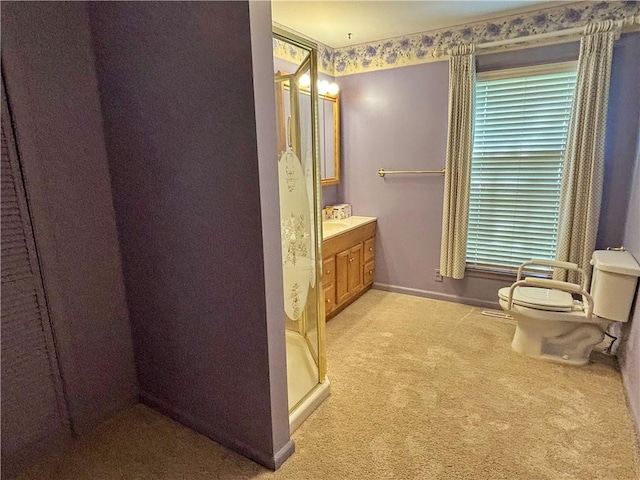 610 S Woodland St, Pittsburg, KS 66762 - full bath featuring toilet, vanity, baseboards, and a shower