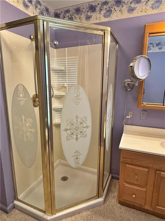 610 S Woodland St, Pittsburg, KS 66762 - full bath with vanity and a shower stall