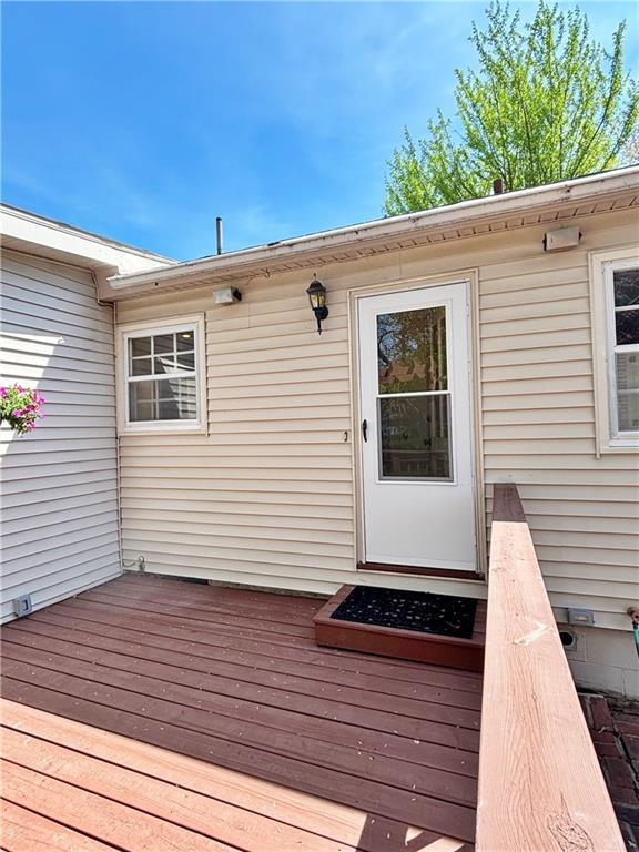 610 S Woodland St, Pittsburg, KS 66762 - property entrance with a deck