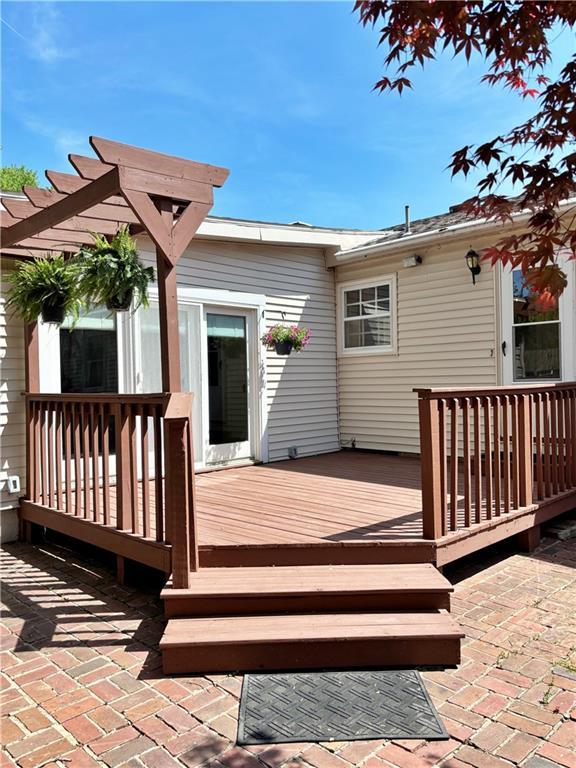 610 S Woodland St, Pittsburg, KS 66762 - deck featuring a patio area and a pergola