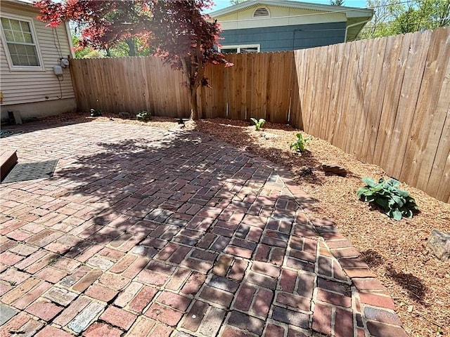610 S Woodland St, Pittsburg, KS 66762 - view of patio / terrace featuring a fenced backyard
