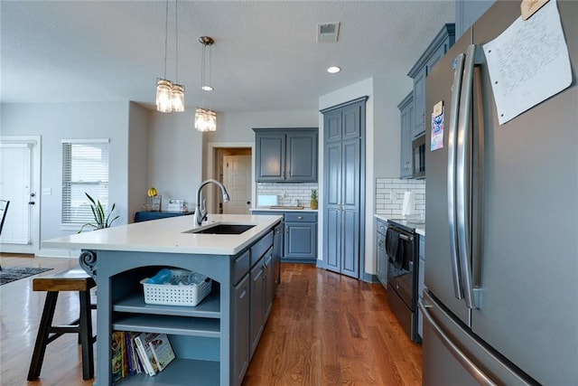 1008 SW Whippoorwill Ln, Oak Grove, MO 64075 - kitchen with stainless steel appliances, dark wood-style flooring, light countertops, decorative backsplash, and open shelves