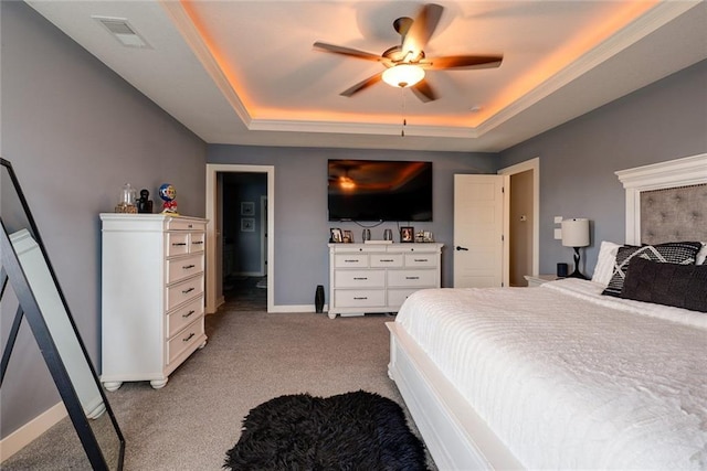 1008 SW Whippoorwill Ln, Oak Grove, MO 64075 - carpeted bedroom with a raised ceiling and ceiling fan