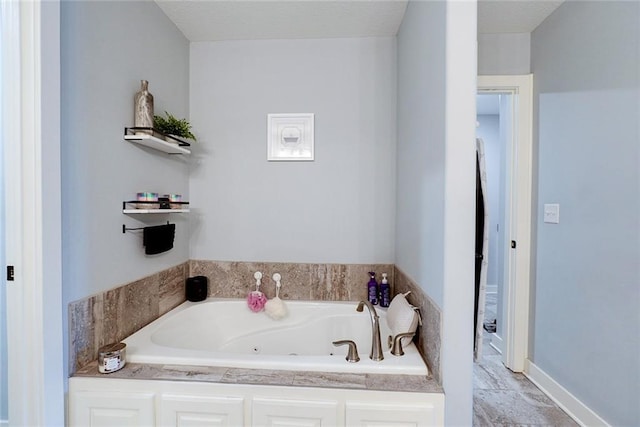 1008 SW Whippoorwill Ln, Oak Grove, MO 64075 - bathroom with a jetted tub