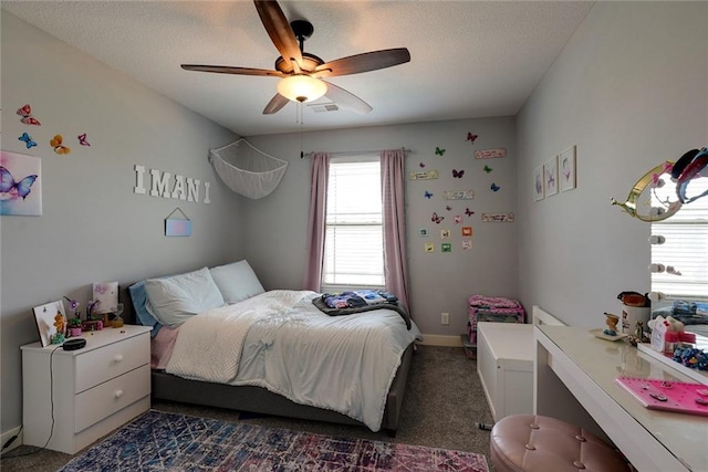 1008 SW Whippoorwill Ln, Oak Grove, MO 64075 - carpeted bedroom with ceiling fan and a textured ceiling