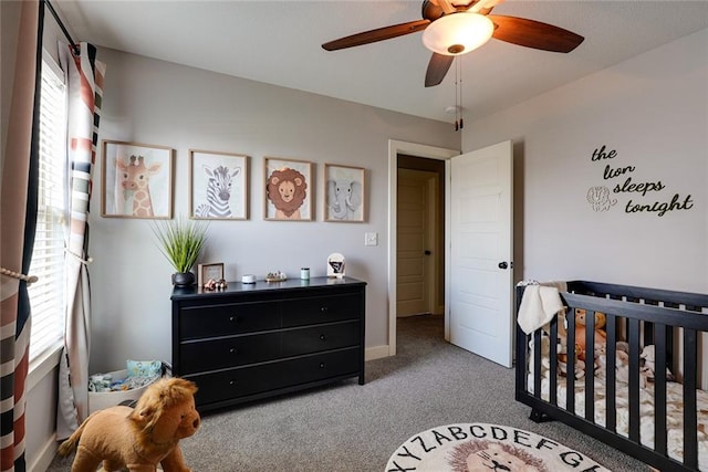 1008 SW Whippoorwill Ln, Oak Grove, MO 64075 - bedroom featuring carpet, a crib, and ceiling fan