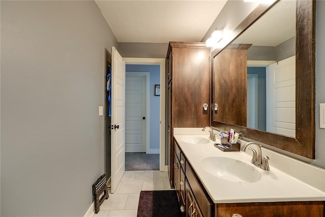1008 SW Whippoorwill Ln, Oak Grove, MO 64075 - full bathroom featuring double vanity and tile patterned floors
