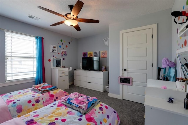 1008 SW Whippoorwill Ln, Oak Grove, MO 64075 - bedroom with carpet flooring, ceiling fan, and a textured ceiling