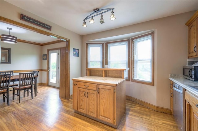 12448 NW Blackwood Dr, Adrian, MO 64720 - kitchen with light countertops, light wood-type flooring, baseboards, and stainless steel appliances