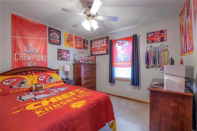 12448 NW Blackwood Dr, Adrian, MO 64720 - bedroom with ceiling fan, carpet floors, and baseboards