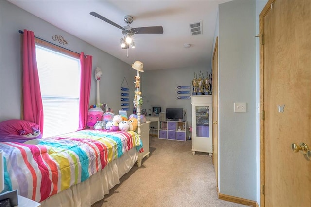 12448 NW Blackwood Dr, Adrian, MO 64720 - carpeted bedroom with visible vents and a ceiling fan
