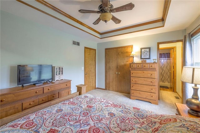 12448 NW Blackwood Dr, Adrian, MO 64720 - bedroom featuring a ceiling fan, a raised ceiling, ornamental molding, carpet flooring, and visible vents