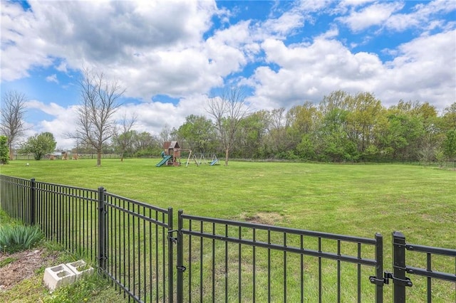 12448 NW Blackwood Dr, Adrian, MO 64720 - view of yard featuring fence and playground community
