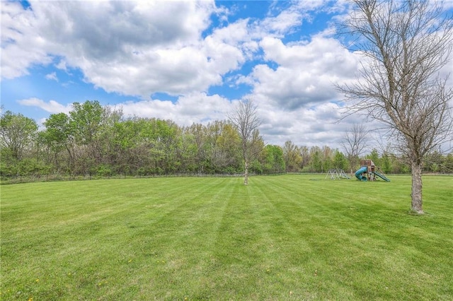 12448 NW Blackwood Dr, Adrian, MO 64720 - view of yard featuring playground community