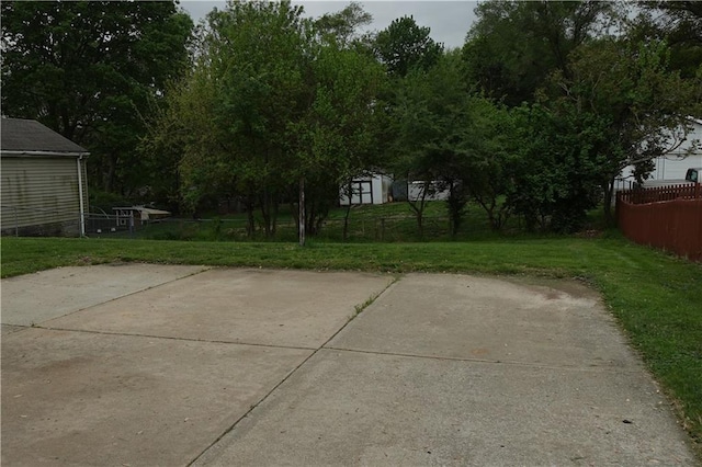 view of patio featuring fence