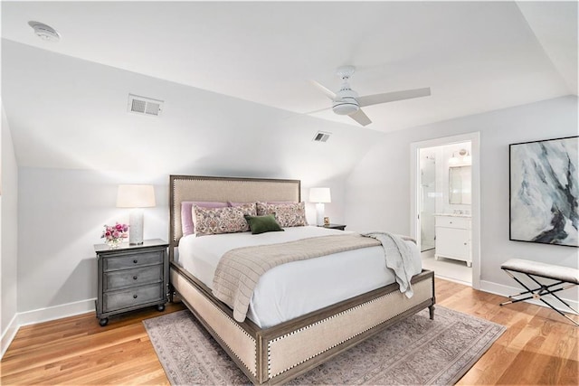 bedroom with visible vents, baseboards, and light wood-style floors