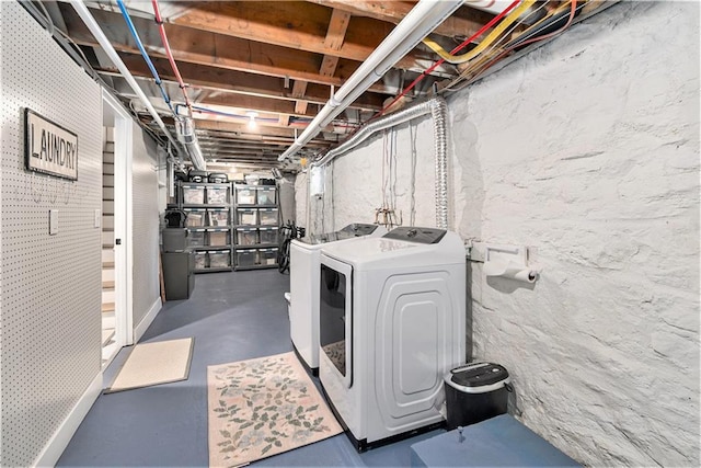 clothes washing area with laundry area and washing machine and dryer