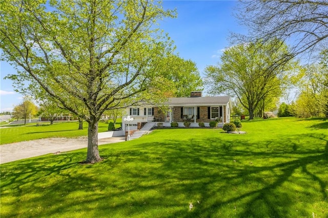 2931 N Washington St, Chillicothe, MO 64601 - view of front of house featuring a porch, a front lawn, and a chimney