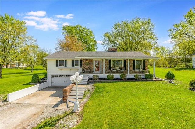 2931 N Washington St, Chillicothe, MO 64601 - view of front of property featuring a front lawn, a porch, a chimney, concrete driveway, and an attached garage