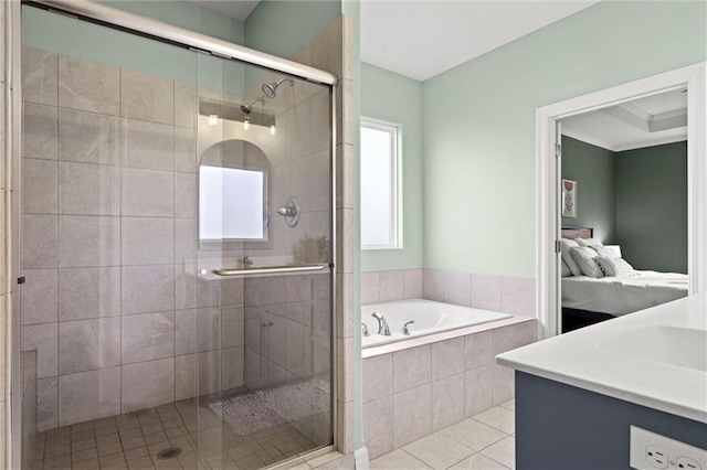 full bathroom featuring a garden tub, a shower stall, vanity, tile patterned floors, and connected bathroom
