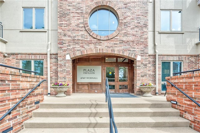 4949 Wornall Rd Unit 203, Kansas City, MO 64112 - doorway to property with brick siding