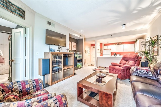 4949 Wornall Rd Unit 203, Kansas City, MO 64112 - carpeted living area with visible vents and ornamental molding