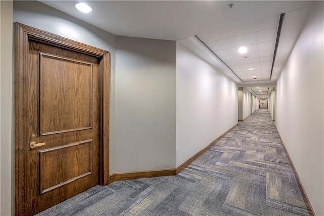 4949 Wornall Rd Unit 203, Kansas City, MO 64112 - corridor featuring carpet, baseboards, and recessed lighting