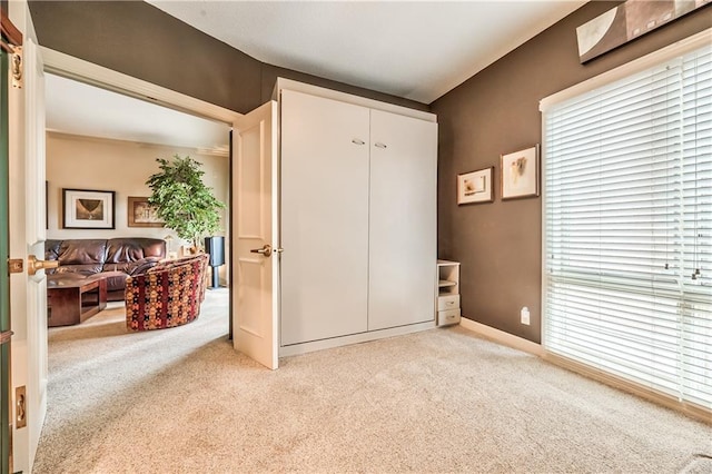 4949 Wornall Rd Unit 203, Kansas City, MO 64112 - bedroom with carpet flooring and a closet