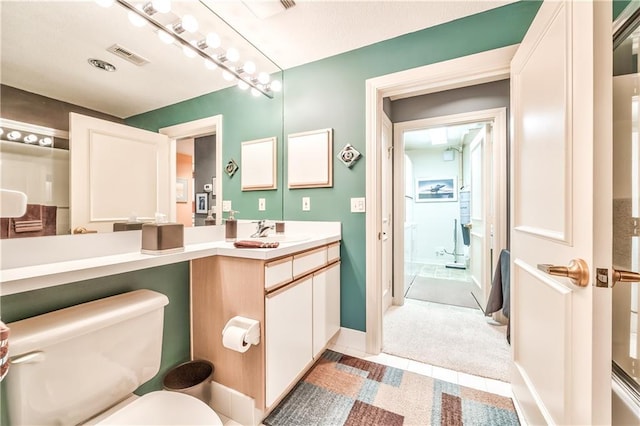 4949 Wornall Rd Unit 203, Kansas City, MO 64112 - bathroom with toilet and vanity