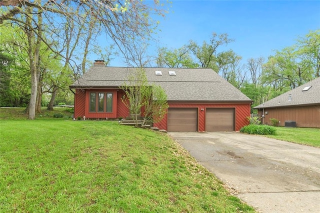 2501 Olde Creek Ct S, Leavenworth, KS 66048 - view of front facade featuring concrete driveway, roof with shingles, a front lawn, and a chimney