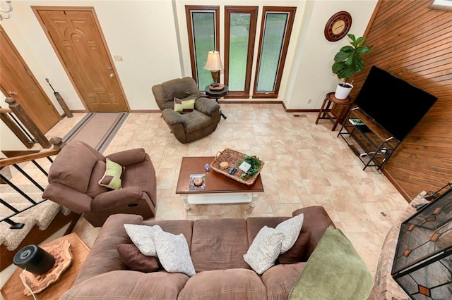 2501 Olde Creek Ct S, Leavenworth, KS 66048 - living room featuring baseboards and stone finish floors